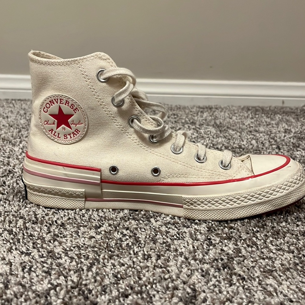 Converse pink and white high tops